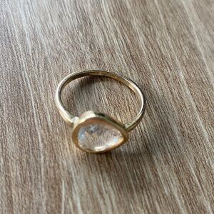 Elegant Gold Toned Ring with Clear Stone accent